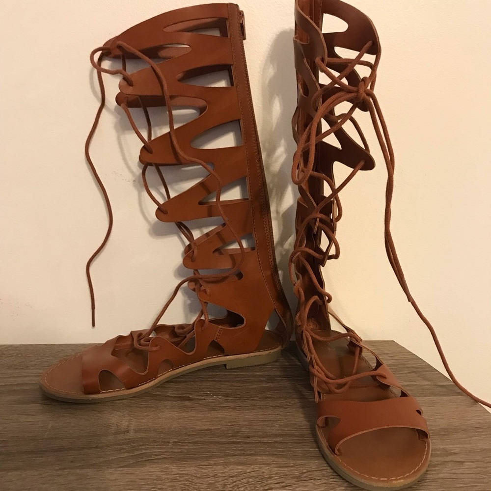 Below the knee gladiator tie sandals